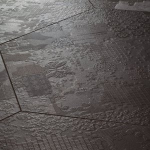 Mutina Déchirer 瓷质砖地面呈现混凝土质感浮雕